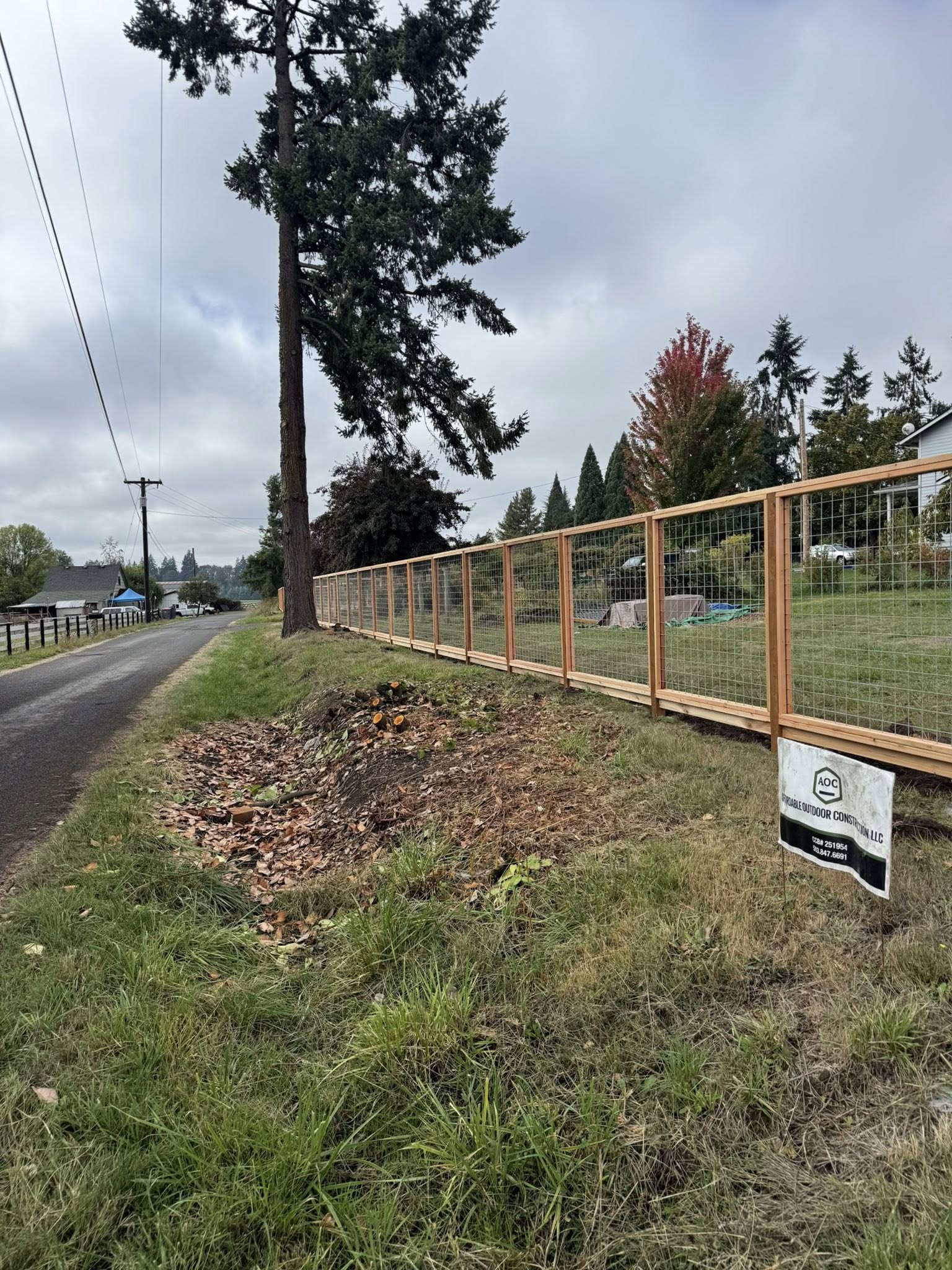 Fence line installation on a large residential lot
